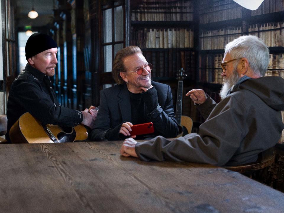 The Edge, Bono and Dave Letterman chat at Marsh's Library in Dublin for the Disney+ documentary, "Bono & the Edge: A Sort of Homecoming, with Dave Letterman," streaming March 17.