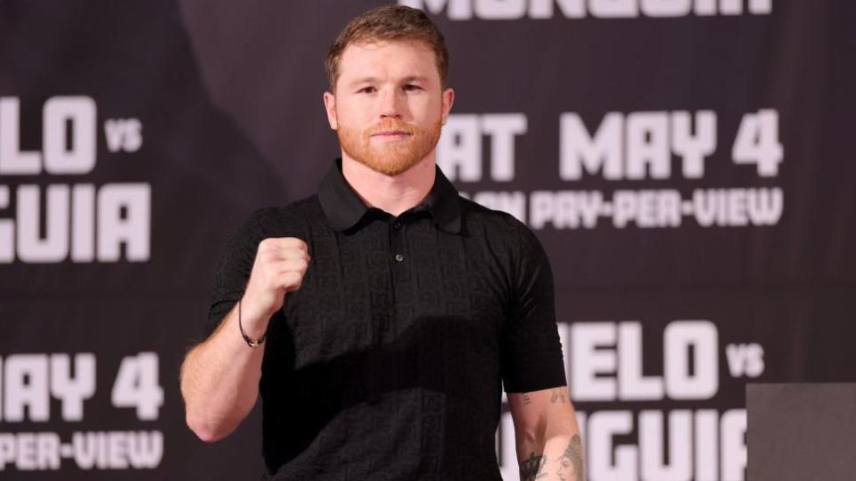 Saul 'Canelo' Alvarez poses for the cameras at a news conference