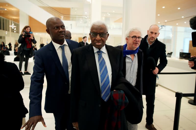 Former President of International Association of Athletics Federations (IAAF) Lamine Diack arrives for his trial at the Paris courthouse