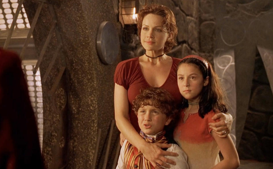 Carla Gugino in Spy Kids alongside Daryl Sabara and Alexa PenaVega