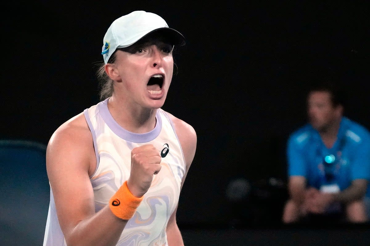 Iga Swiatek celebrates after defeating Camila Osorio (Dita Alangkara/AP) (AP)