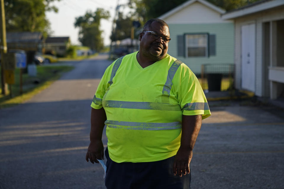 Conrad Jones, a resident whose neighborhood is near the land where a proposed Formosa plant is to be built, speaks in Welcome, La., Thursday, Sept. 15, 2022. "You just trust in God," said Conrad Jones. "But there's a risk any where you go. And they are going to do what they want anyway." (AP Photo/Gerald Herbert)