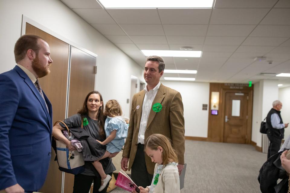 Sam Kennedy III and wife Rachel, who own Kettle Mills Farms, attend a House hearing with their children in support of a bill that would preserve the Duck River, which runs through their property in Maury County.