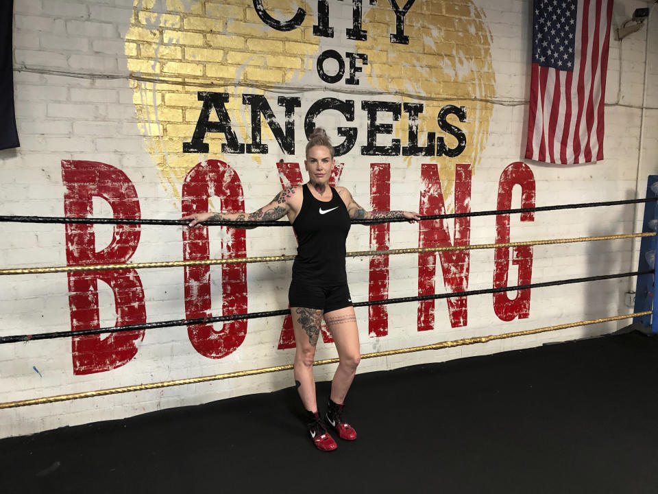 In this Thursday, Aug. 16, 2018 Bec Rawlings, of Australia, poses in the ring after a bare-knuckle sparring session at City of Angels Boxing Club in Los Angeles. Rawlings is a longtime UFC fighter who will fight on the second sanctioned bare-knuckle boxing show in the U.S. in over a century on Saturday, Aug. 25, in Biloxi, Miss. (AP Photo/Greg Beacham)