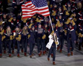 <p>Erin Hamlin carries the flag of the United States during the opening ceremony of the 2018 Winter Olympics in Pyeongchang, South Korea, Friday, Feb. 9, 2018. (Sean Haffey/Pool Photo via AP) </p>