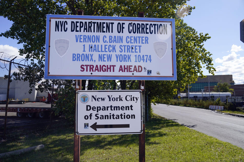 FILE — A sign marking the entrance of the Vernon C. Bain Correctional Center is seen in the Bronx borough of New York, Monday, Oct. 16, 2023. It arrived in 1992 as a temporary measure to ease overcrowding on Rikers Island, the city's main jail complex for detainees awaiting trial. Three decades later, the 800-bed lockup – believed to be the last operating prison ship in the United States — is finally closing down. (AP Photo/Seth Wenig, File)