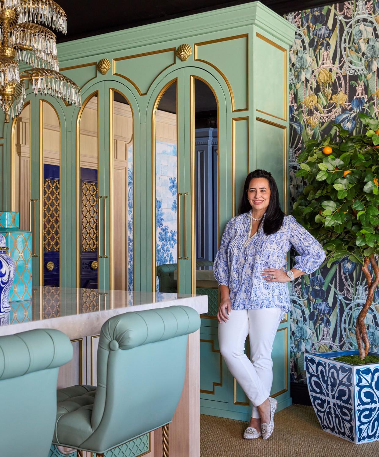 Alexandra Naranjo describes herself as a ‘maximalist traditionalist’ when it comes to interior design. Inside her showroom on Antique Row in West Palm Beach, she created custom millwork (manufactured by Art Boulle) and wallpaper by Mind the Gap.