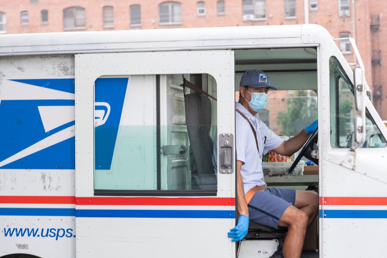 Social media users draw attention to USPS merch store in an effort to save the postal service. (Photo: Getty Images)