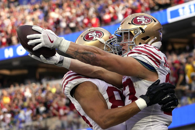 McCaffrey throws, catches, rushes for TDs, Niners rout Rams – KXAN Austin