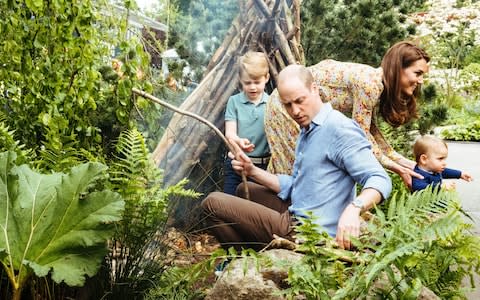 Prince William and Prince George are in charge of making the campfire - Credit: Matt Porteous