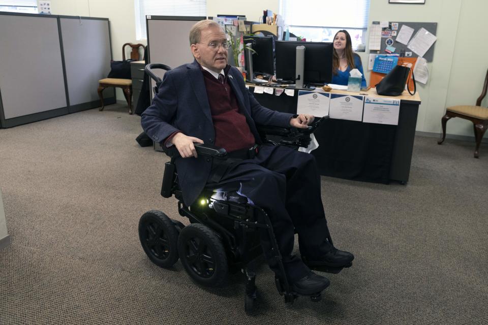 Rep. Jim Langevin, D-R.I., goes back to his office after speaking with a staffer, Friday, March 25, 2022, in Warwick, R.I. After the Capitol riot, Langevin said he thought briefly that the foolishness and recklessness of dividing the country would finally stop. That didn’t happen, and the Rhode Island Democrat says it’s one reason why he’s leaving Congress. (AP Photo/Michael Dwyer)