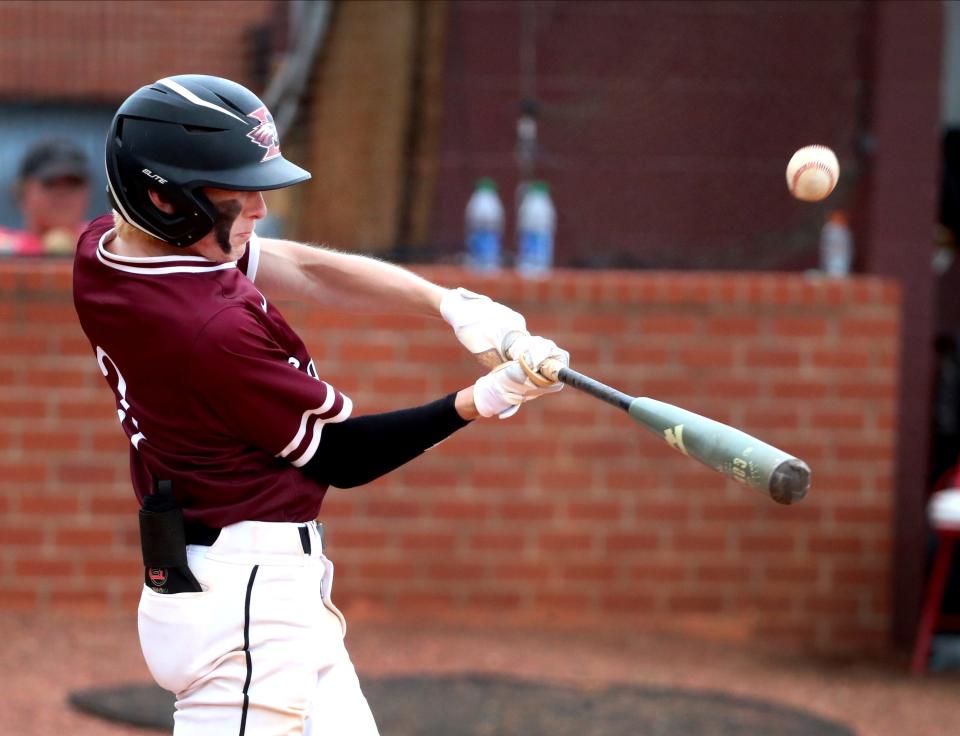 Eagleville's Brayden Baker (3) makes contact with the ball that was caught for an out but brought in Eagleville's Keydon Bassham (11) during the 2022 Division 1 Class 1A State Baseball Tournament on Friday, May 27, 2022, at Eagleville.