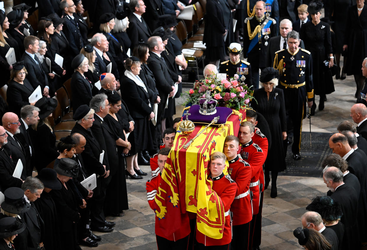 LONDON, ENGLAND - SEPTEMBER 19: Britain's King Charles III, Camilla, Queen Consort, Anne, Princess Royal, Vice Admiral Sir Timothy Laurence, Prince Andrew, Duke of York, Prince Edward, Earl of Wessex, Sophie, Countess of Wessex follow behind the coffin of Queen Elizabeth II with the Imperial State Crown resting on top of it carried by pallbearers as it departs Westminster Abbey during the State Funeral of Queen Elizabeth II on September 19, 2022 in London, England. Elizabeth Alexandra Mary Windsor was born in Bruton Street, Mayfair, London on 21 April 1926. She married Prince Philip in 1947 and ascended the throne of the United Kingdom and Commonwealth on 6 February 1952 after the death of her Father, King George VI. Queen Elizabeth II died at Balmoral Castle in Scotland on September 8, 2022, and is succeeded by her eldest son, King Charles III.  (Photo by Gareth Cattermole/Getty Images)