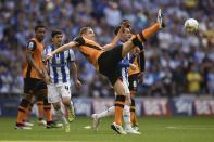 Britain Soccer Football - Hull City v Sheffield Wednesday - Sky Bet Football League Championship Play-Off Final - Wembley Stadium - 28/5/16 Hull City's Michael Dawson in action with Sheffield Wednesday's Kieran Lee Action Images via Reuters / Tony O'Brien Livepic EDITORIAL USE ONLY. No use with unauthorized audio, video, data, fixture lists, club/league logos or "live" services. Online in-match use limited to 45 images, no video emulation. No use in betting, games or single club/league/player publications. Please contact your account representative for further details.