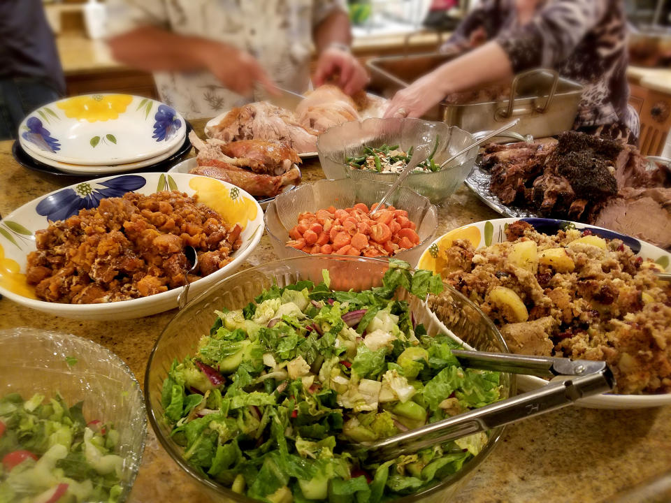 various thanksgiving side dishes on a serving table