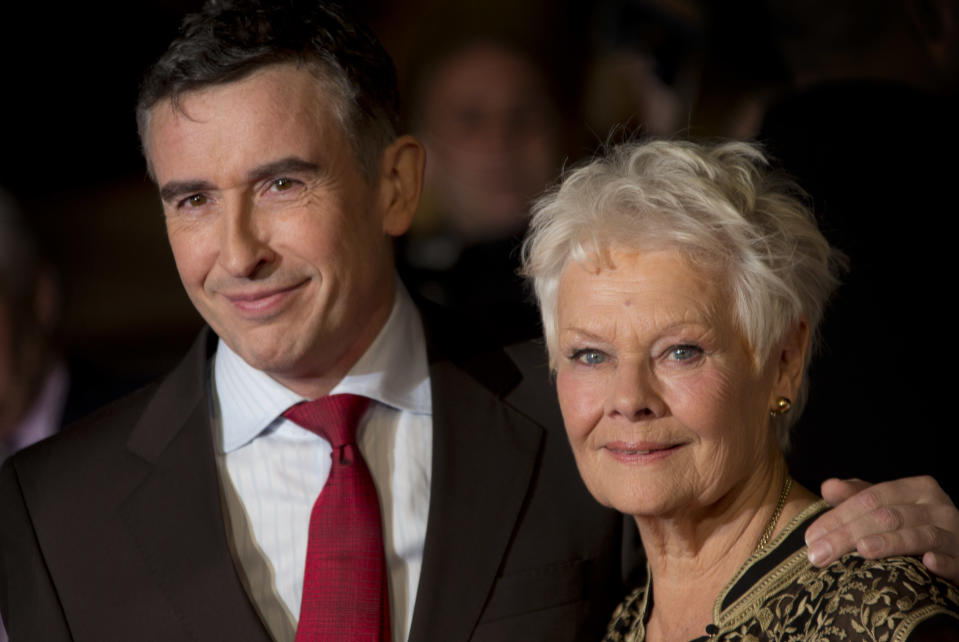 British actors Steve Coogan and Dame Judi Dench pose together during the red carpet arrivals for the screening of Philomena, as part of the 57th BFI London Film Festival, at a central London cinema, Wednesday, Oct. 16, 2013. (Photo by Joel Ryan/Invision/AP)