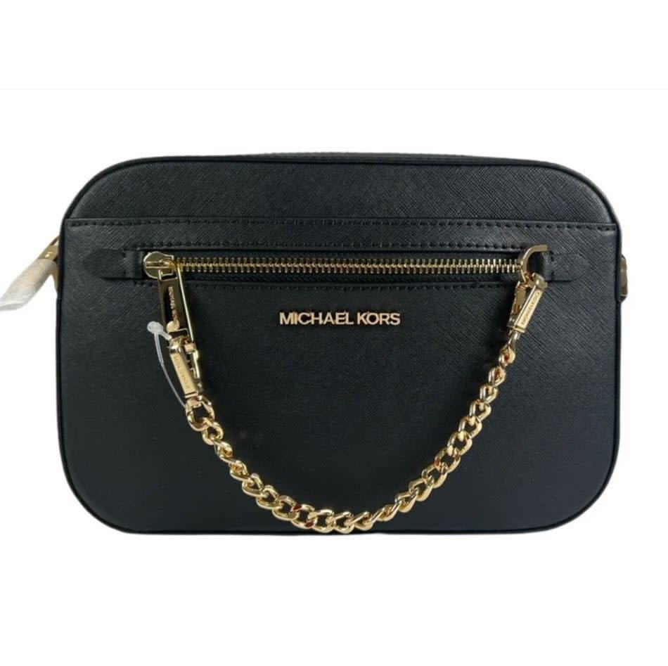 Black Michael Kors purse with gold chain and zipper detail