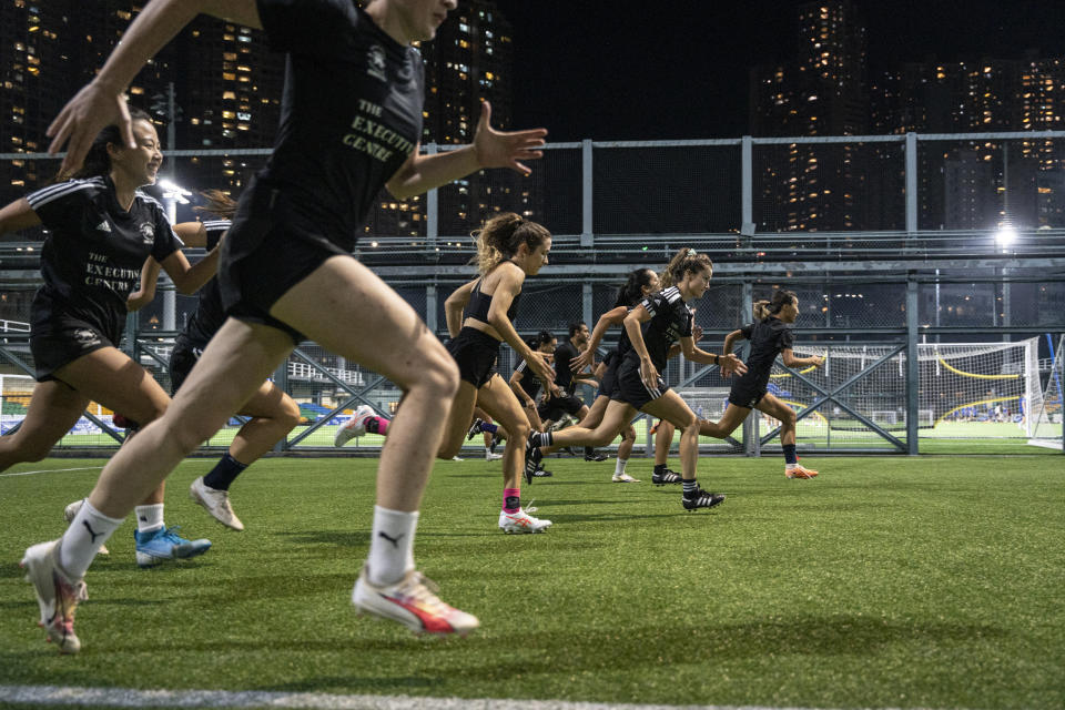 Women's seven-a-side team train in Happy Valley ahead of the Gay Games in Hong Kong, Tuesday, Oct. 31, 2023. Set to launch on Friday, Nov. 3, 2023, the first Gay Games in Asia are fostering hopes for wider LGBTQ+ inclusion in the Asian financial hub. (AP Photo/Chan Long Hei)