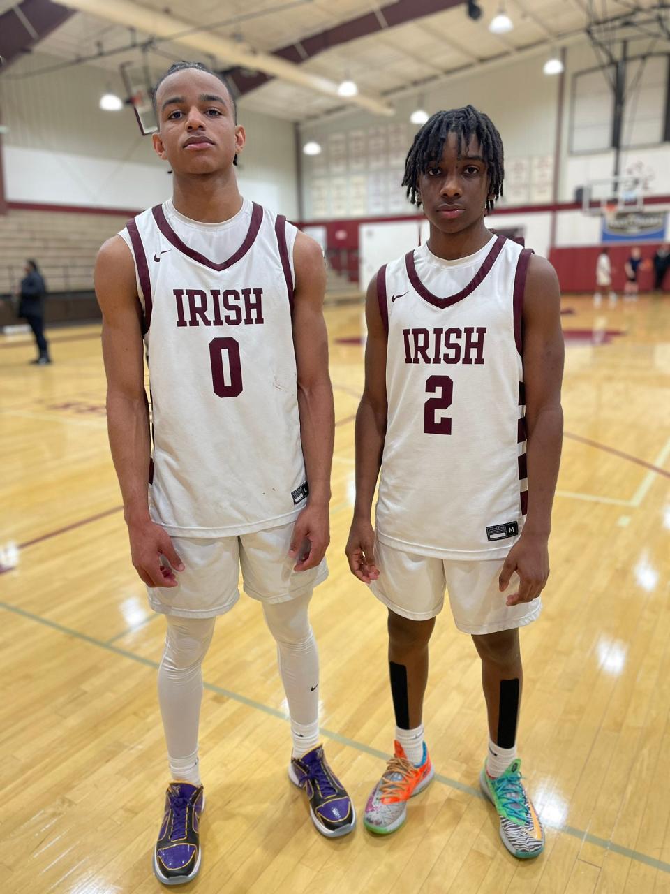 Aquinas junior Jadeir Breedlove (0) dropped 27 points in a 60-47 win over Monroe. Sophomore Christian McCullough (2) scored 19 to help the Irish improve to 10-0.