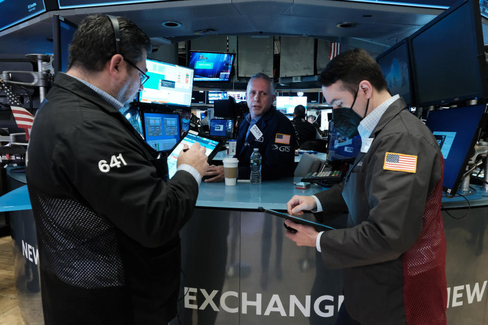 NEW YORK, NEW YORK - MARCH 28: Traders work on the floor of the New York Stock Exchange (NYSE) on March 28, 2022 in New York City. Following a positive week for stocks, the Dow Industrial Average was down over 100 points in morning trading. (Photo by Spencer Platt/Getty Images)