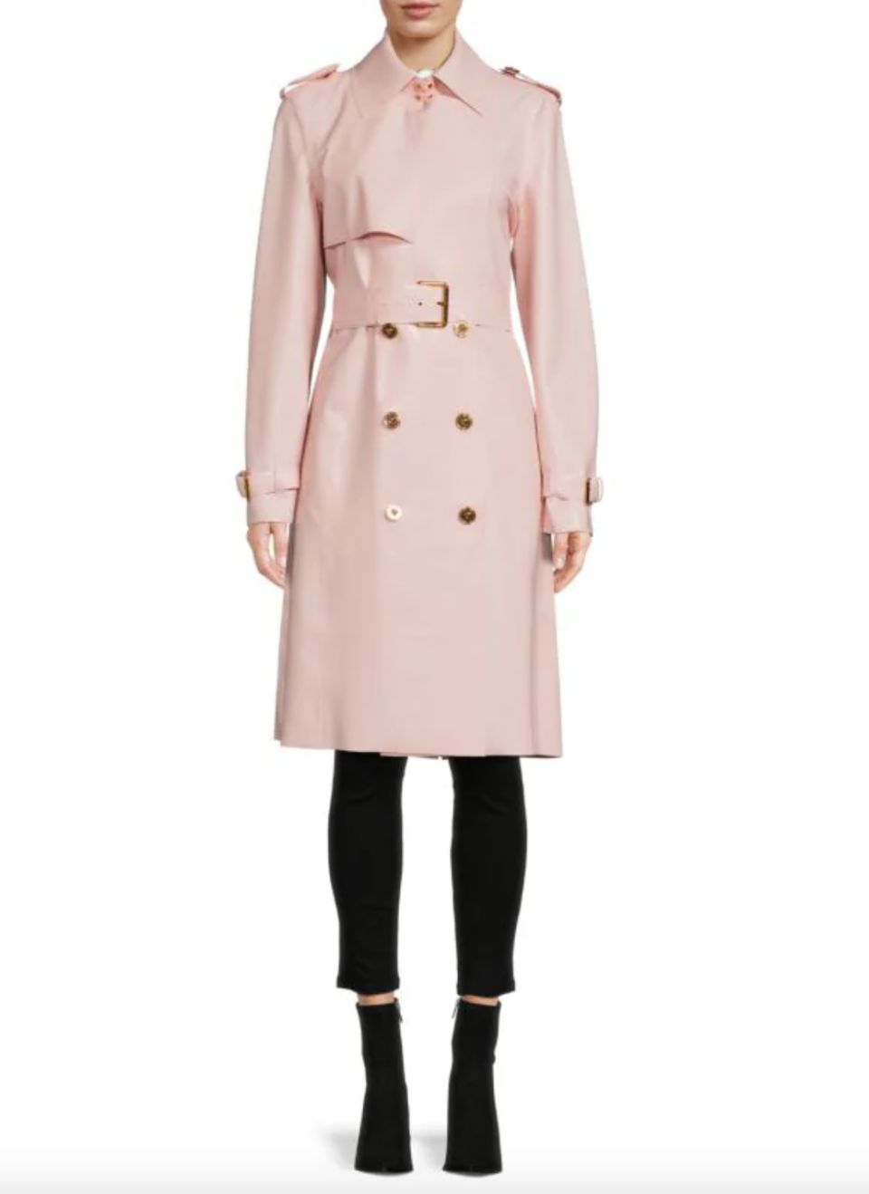 a model wears a pink trench coat