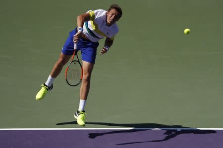 Mar 28, 2017; Miami, FL, USA; Nicolas Mahut of France serves against Rafael Nadal of Spain (not pictured) on day eight of the 2017 Miami Open at Crandon Park Tennis Center. Mandatory Credit: Geoff Burke-USA TODAY Sports