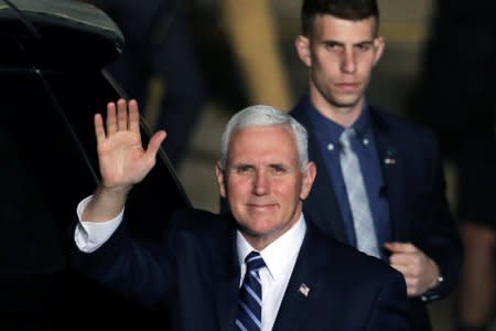 U.S. Vice President Mike Pence waves upon their arrival at Ben Gurion international Airport in Lod, near Tel Aviv, Israel January 21, 2018. REUTERS/Ammar Awad