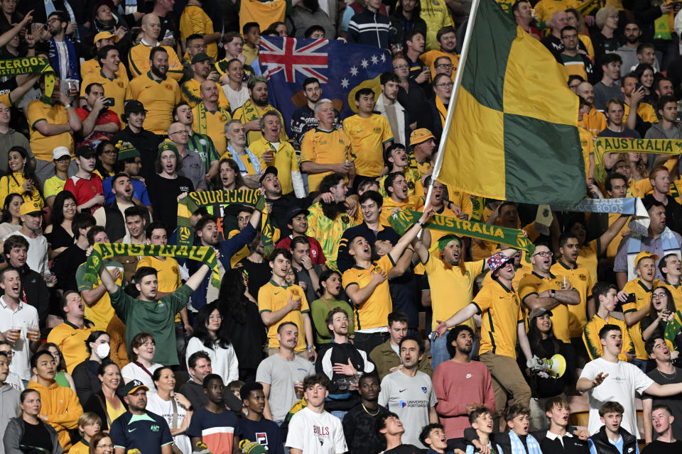 Australian fans cheer during a friendly soccer international between Australia and New Zealand in Brisbane, Australia, Thursday, Sept. 22, 2022. (AP Photo/Dan Peled)