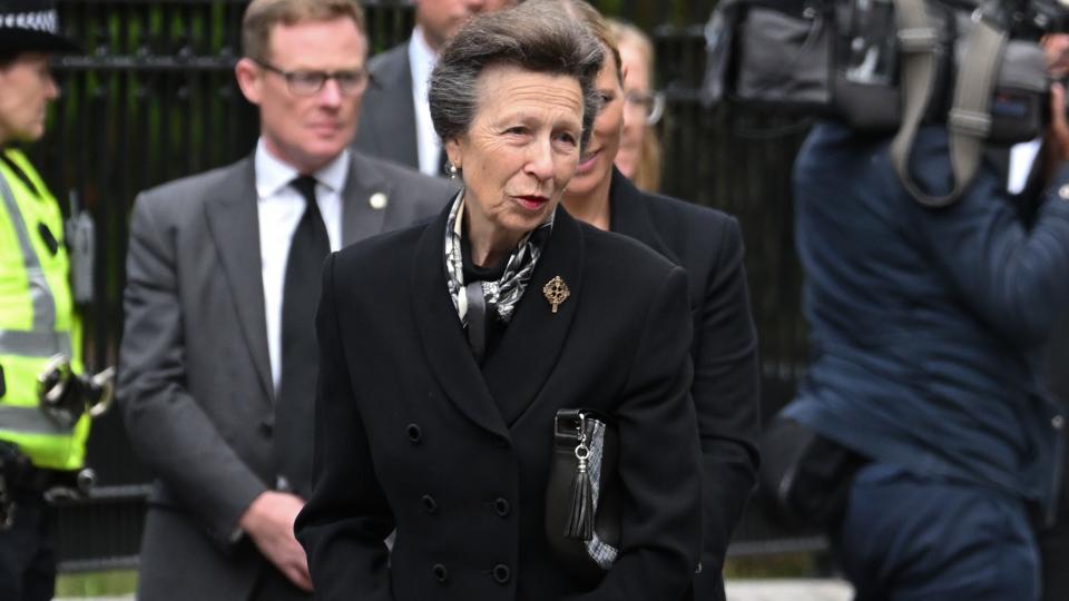 ABERDEEN, SCOTLAND - SEPTEMBER 10: Anne, Princess Royal views the flowers left by mourners outside Balmoral Castle on September 10, 2022 in Aberdeen, Scotland. Elizabeth Alexandra Mary Windsor was born in Bruton Street, Mayfair, London on 21 April 1926. She married Prince Philip in 1947 and acceded to the throne of the United Kingdom and Commonwealth on 6 February 1952 after the death of her Father, King George VI. Queen Elizabeth II died at Balmoral Castle in Scotland on September 8, 2022, and is succeeded by her eldest son, King Charles III.