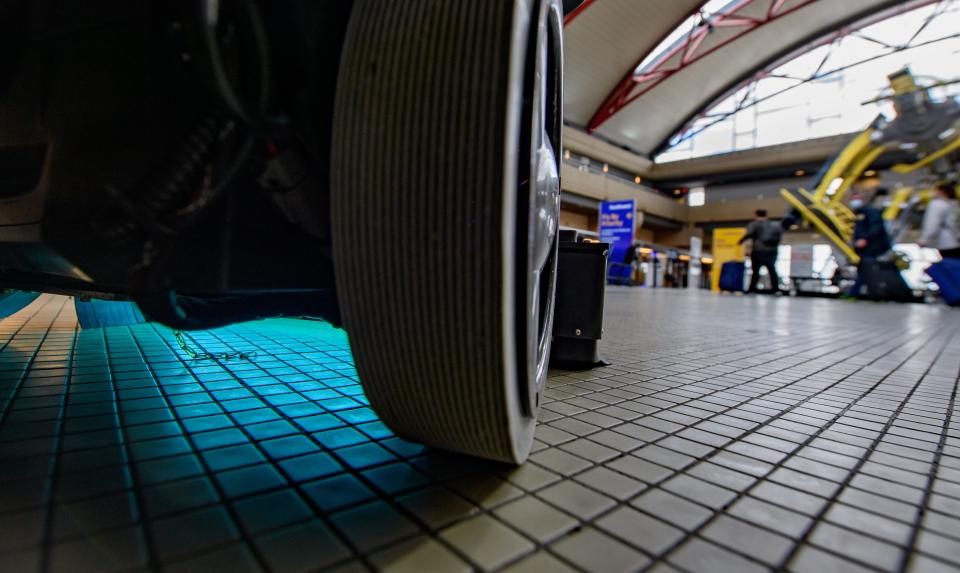 A UV cleaning robot cleans the floor near the ticketing windows at Pittsburgh International Airport on May 7, 2020 in Pittsburgh, Pennsylvania.