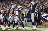 Jan 16, 2016; Foxborough, MA, USA; New England Patriots tight end Rob Gronkowski (87) celebrates after scoring a touchdown against the Kansas City Chiefs during the third quarter in the AFC Divisional round playoff game at Gillette Stadium. Mandatory Credit: Greg M. Cooper-USA TODAY Sports