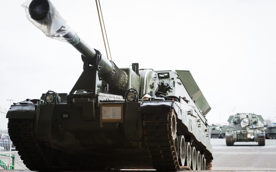 A British Army AS90 self propelled gun arrives in the port of Emden, Germany to be loaded and transported to Estonia - Credit: Dominic King/Army press office Germany