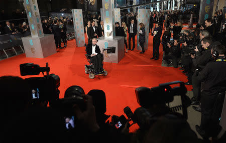 Theoretical physicist Stephen Hawking arrives at the British Academy of Film and Arts (BAFTA) awards ceremony at the Royal Opera House in London February 8, 2015. REUTERS/Toby Melville