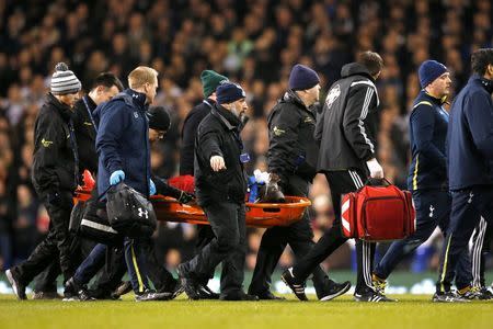 Football - Tottenham Hotspur v Swansea City - Barclays Premier League - White Hart Lane - 4/3/15 Swansea's Bafetimbi Gomis is stretchered off with an injury Action Images via Reuters / John Sibley Livepic