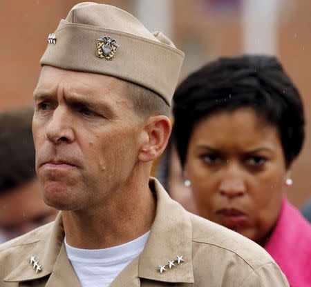 U.S. Navy Vice-Admiral Dixon Smith (L) and Washington DC Mayor Muriel Bowser (R) address the media following a lockdown at the U.S. Navy Yard in Washington July 2, 2015. REUTERS/Jonathan Ernst