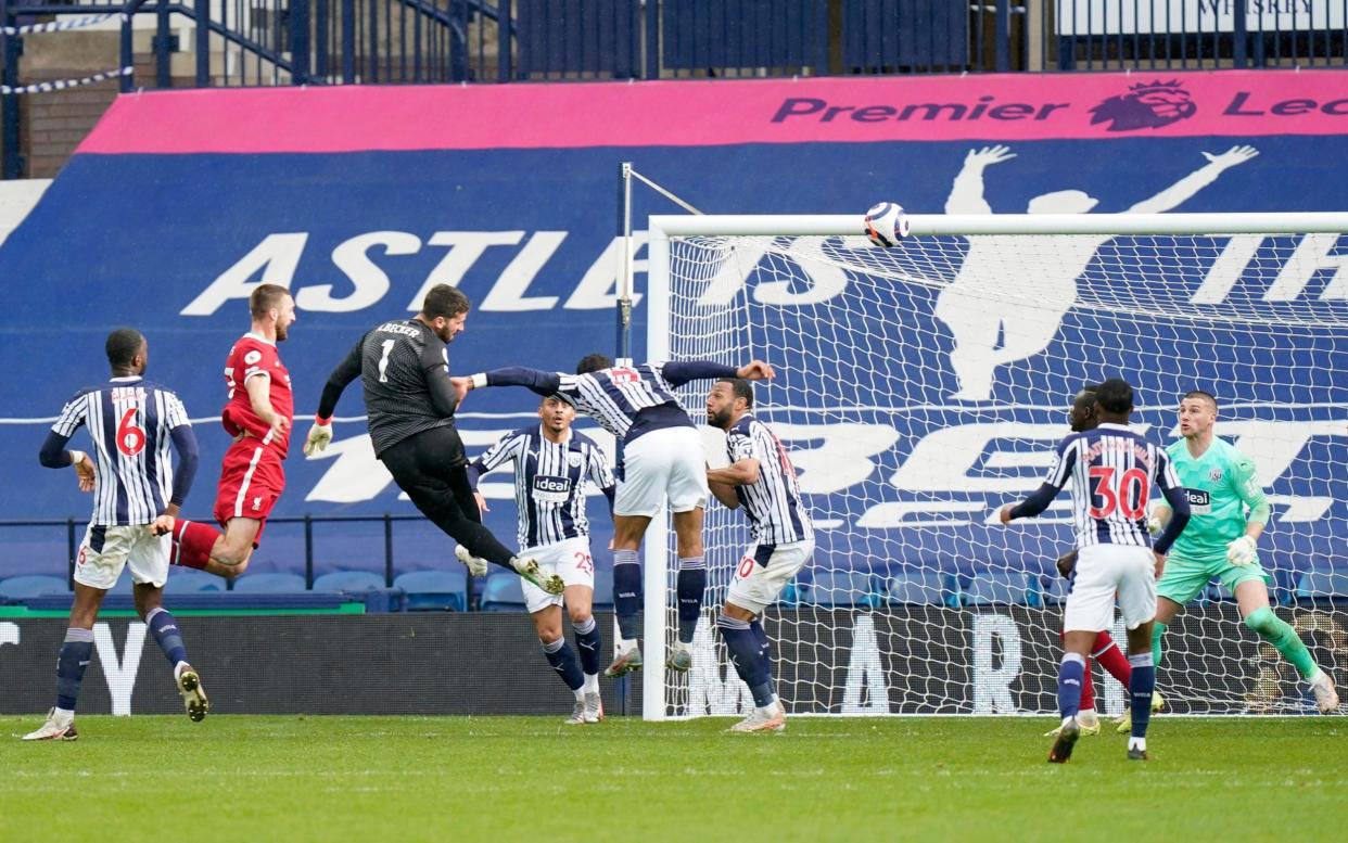 Alisson scores injury-time winner as Liverpool boost Champions League chances with win over WBA - GETTY IMAGES