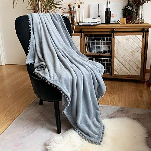 5) LOMAO Flannel Blanket with Pompom Fringe