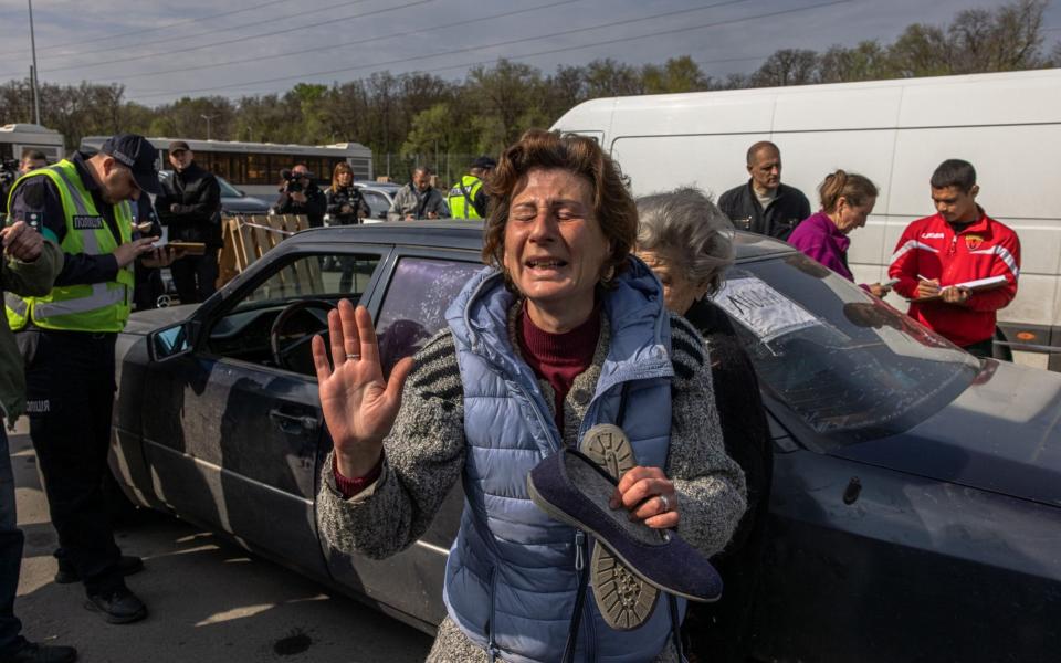 Natalia reacts after arriving from Mariupol to an evacuation point in Zaporizhzhia, Ukraine, 02 May 2022.  - Roman Pilipey/Shutterstock