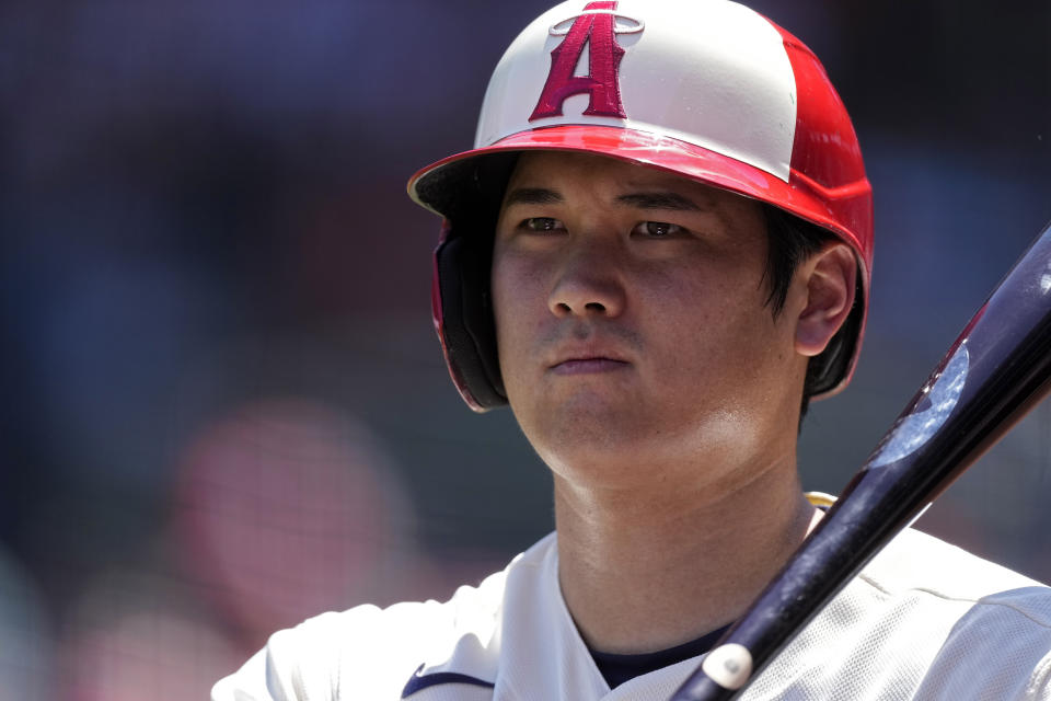 Los Angeles Angels' Shohei Ohtani stands in the on-deck circle during the first inning in the first baseball game of a doubleheader against the Cincinnati Reds Wednesday, Aug. 23, 2023, in Anaheim, Calif. (AP Photo/Mark J. Terrill)