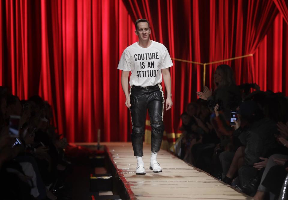 Fashion designer Jeremy Scott walks down the catwalk after the unveiling of the Moschino women's Fall-Winter 2017-18 collection, that was presented in Milan, Italy, Thursday, Feb. 23, 2017. (AP Photo/Luca Bruno).