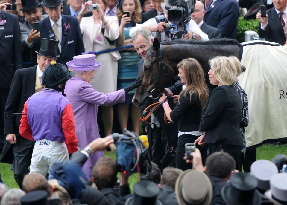 The Queen congratulates her horse, Estimate, following a Gold Cup win on Ladies’ Day at Royal Ascot in 2013 (Getty Images)