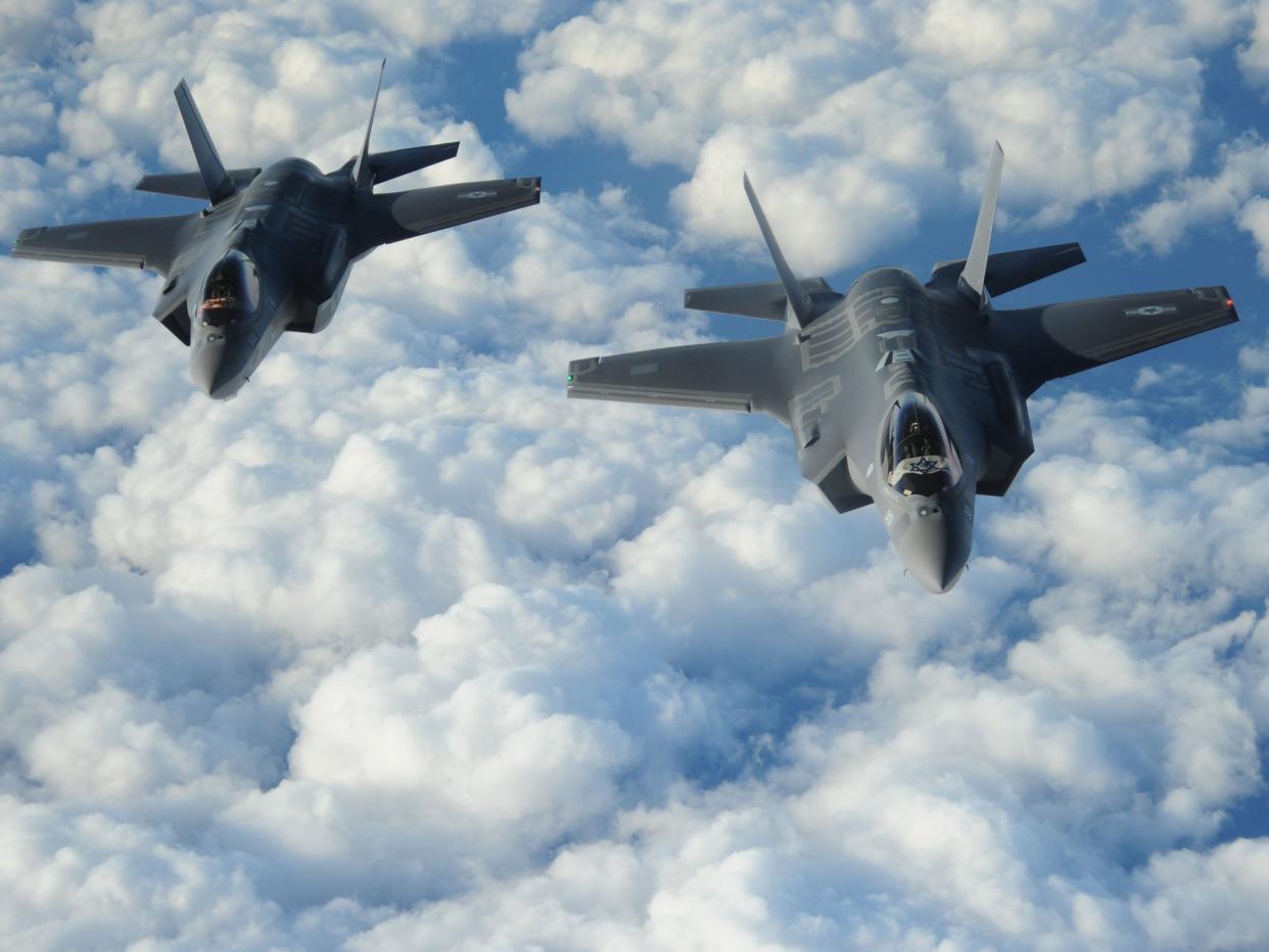 Two Israeli F-35 'Adirs' fly in formation, displaying the US and Israeli flags: EPA/US AIR FORCE/1ST LT ERIK D ANTHONY