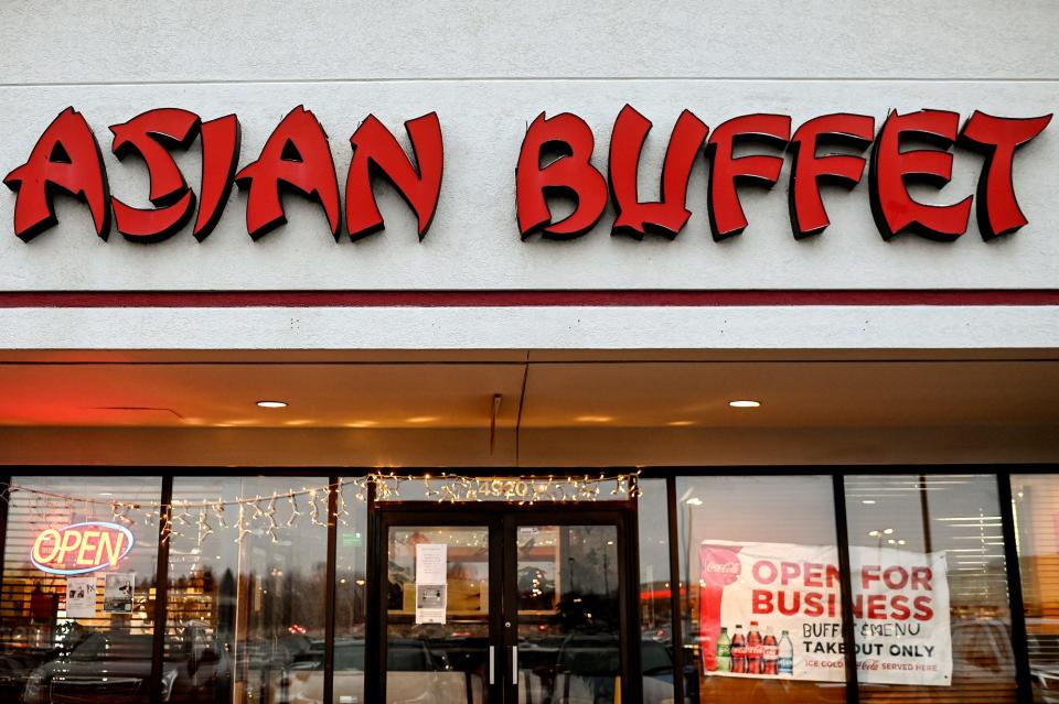 The Asian Buffet restaurant, photographed on Friday, Dec. 11, 2020, in Okemos, offers buffet and menu items for takeout during the pandemic.