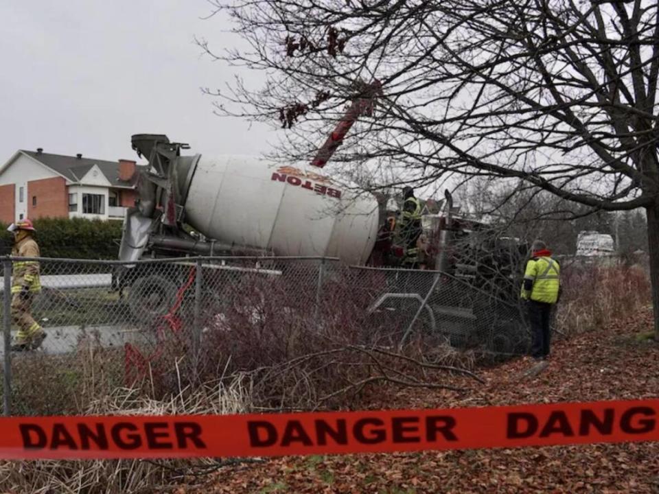 The crash involving a cement truck happened around 10:30 a.m. on De La Vérendrye Boulevard near Ernest-Gaboury Street in Gatineau, Que., police say. (Patrick Louiseize/Radio-Canada - image credit)