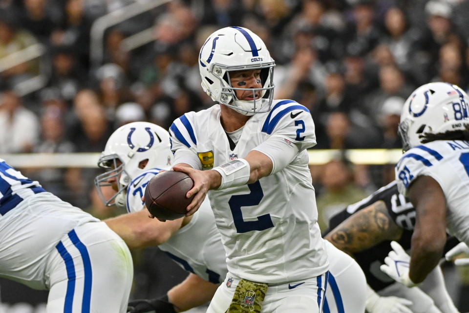 Indianapolis Colts quarterback Matt Ryan (2) fakes a hands off in the first half of an NFL football game against the Las Vegas Raiders in Las Vegas, Sunday, Nov. 13, 2022. (AP Photo/David Becker)