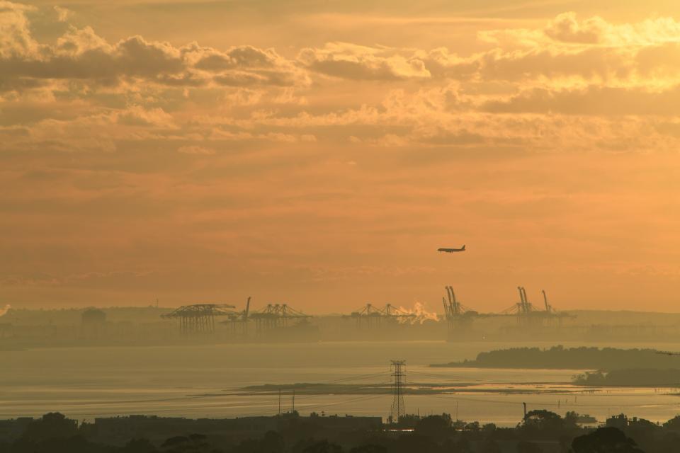 Smoke blanketing the CBD and basin as bush fire reduction burns continued west of the city on Wednesday. Source: AAP