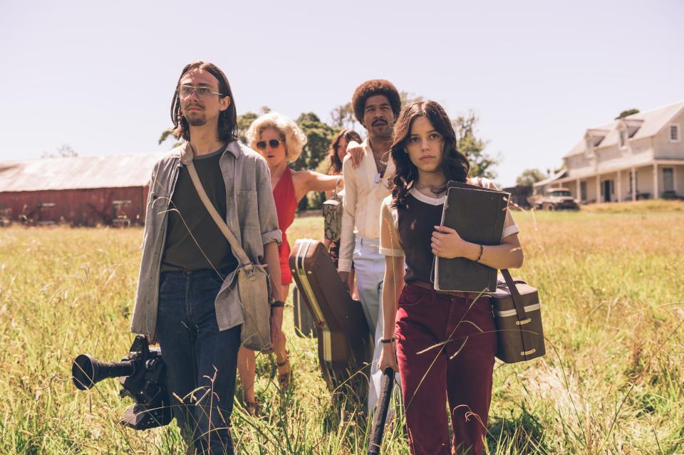 Owen Campbell (from left), Brittany Snow, Mia Goth, Scott Mescudi and Jenna Ortega play a group of filmmakers who travel to Texas to make an adult film and run afoul of a weird elderly couple in "X."