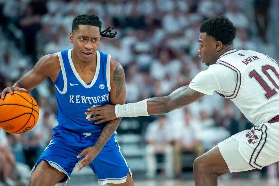 Kentucky guard Rob Dillingham (0) drives against Mississippi State’s Dashawn Davis (10) on Tuesday night. Dillingham finished with nine points, two rebounds and two assists. Ryan C. Hermens/rhermens@herald-leader.com