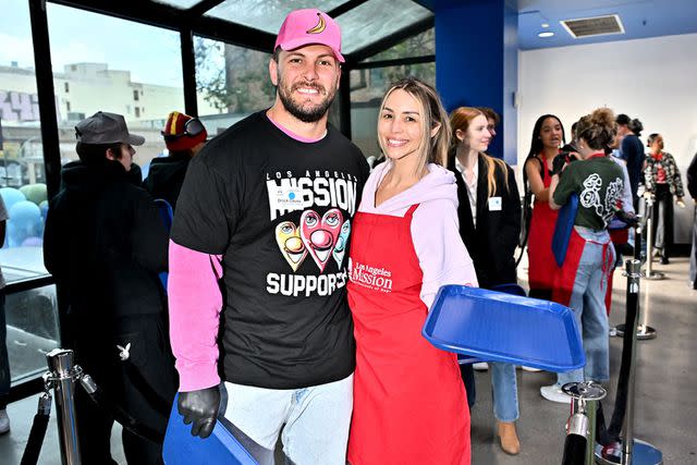 <p>Rob Latour/Shutterstock </p> Brock Davies and Scheana Shay at Los Angeles Mission to Serve Up Easter Meals for the Skids Row Community