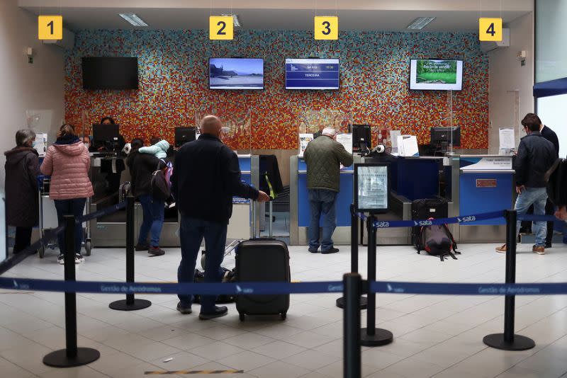 People leave Sao Jorge island on the last commercial flight of the day, in Velas, Azores